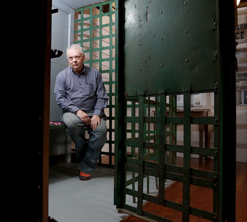 Jim Millar in old jail at Port Moody Station Museum