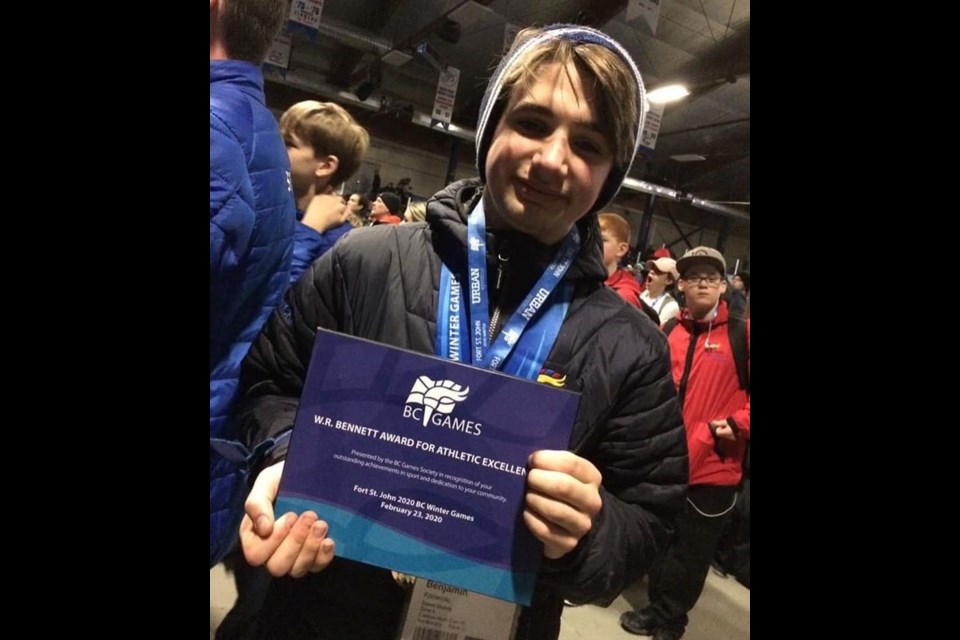 Thirteen-year-old Ben Konwicki of the Prince George Blizzard Speed Skating Club holds the plaque he received as winner of the W.R. Bennett Award for athletic excellence at the closing ceremonies at the B.C. Winter Games Sunday in Fort St. John.