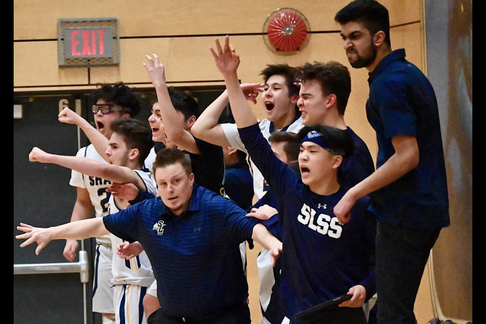 Steveston-London bench erupts after Vincent Zeng hit a deep three-pointer in the final minute to help his team to a thrilling 61-57 win over McMath on Friday and clinch a spot in next week's BC 3A Championships.
