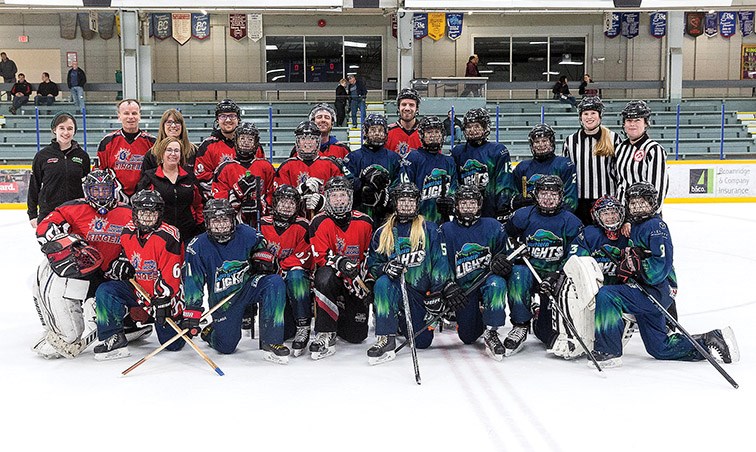 Citizen Photo by James Doyle. All the participants pose for a group photo on Saturday afternoon at Rolling Mix Concrete Arena after PG Ringette’s Media Game that saw the U14 zone team take on members of Prince George’s media community.