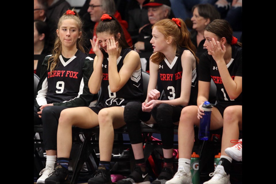 MARIO BARTEL/THE TRI-CITY NEWS
A stoic bench of Terry Fox Ravens players looks on as the team loses to the Semiahmoo Totems, 114-62, in Saturday's BC Secondary School Assocation AAAA senior girls basketball championship at the Langley Events Centre.