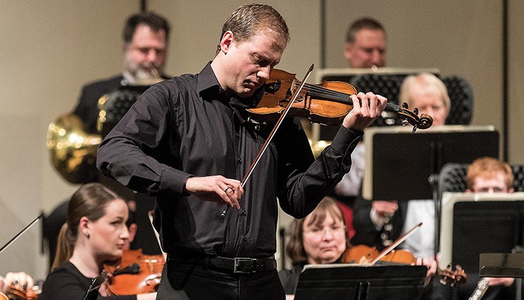 Citizen Photo by James Doyle. Jonathan Crow performs on stage with the Prince George Symphony Orchestra on Saturday night at Vanier Hall.