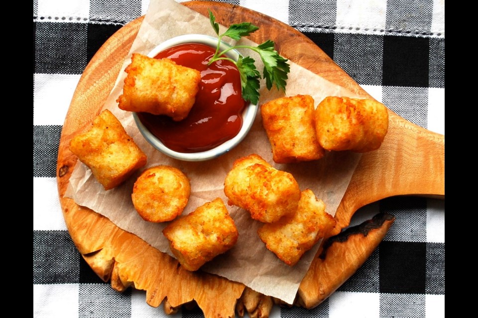 These homemade potato tots are golden and crisp on the outside, hot and flavourful in the centre.