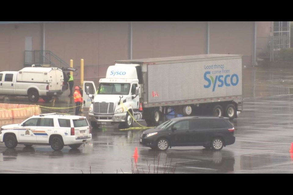 RCMP are at the scene of a workplace incident at the Sysco facility in Langford on Monday, March 2, 2020.