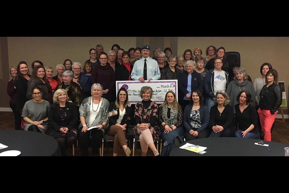 100 Women Who Care Dawson Creek present Captain Lorne Stromquist of the DC Air Cadet Squadron with $12,700.