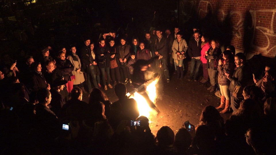 Chaharshanbe Suri, or the Festival of Fire, includes jumping over bonfires as a way of taking away n