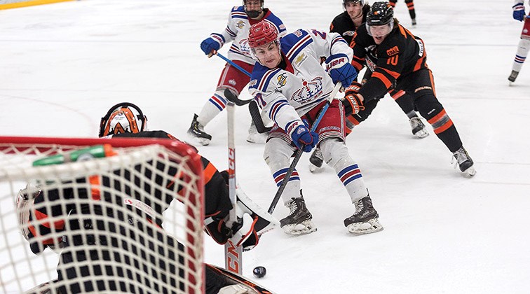 Citizen Photo by James Doyle. Prince George Spruce Kings forward Andrew Seaman breaks in alone and tries to put the puck past Trail Smoke Eaters goaltender Logan Terness on Tuesday night at Rolling Mix Concrete Arena in the fourth game of their best-of-seven playoff series.