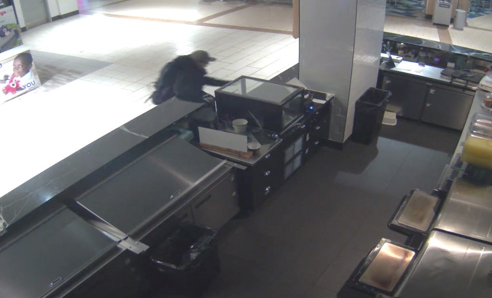 A screen shot taken from security video during a break-in at at Coquitlam Centre.