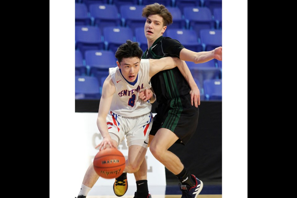 MARIO BARTEL/THE TRI-CITY NEWS
Centennial Centaurs Nick Fang drives the baseline against Prince George Polars defender Brannigan Douglas in the first half of their opening round game at the BC High School boys AAAA basketball championships, Wednesday at the Langley Events Centre. Centennial won, 80-46.
