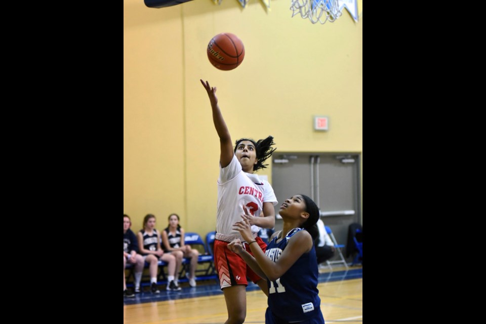 Tournament MVP Ankita Chopra puts up another two points for her Burnaby Central Wildcats at the B.C. Grade 8 girls championship finals last week in Abbotsford.