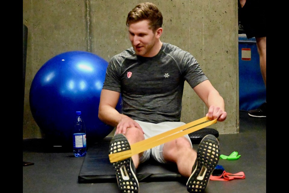 Tsawwassen field hockey standout Mark Pearson is working hard these days to re-join his senior men's national teammates and play in the Toyko Olympics after rupturing his achilles tendon last summer at the Pan Am Games.