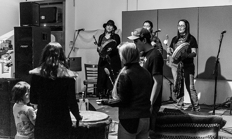 Citizen Photo by James Doyle. Two Wet’suwet’en songs were played on the drums to open the show on Saturday night at the Omineca Arts Centre as part of the Stand With Wet’suwet’en live music fundraiser.