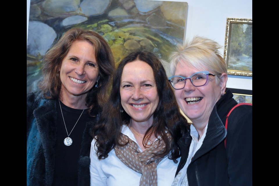 Pemberton Studio 195 artist Shirley Claire-Williams (centre) with friends Lori Goldberg and Marney-Rose Edge.
