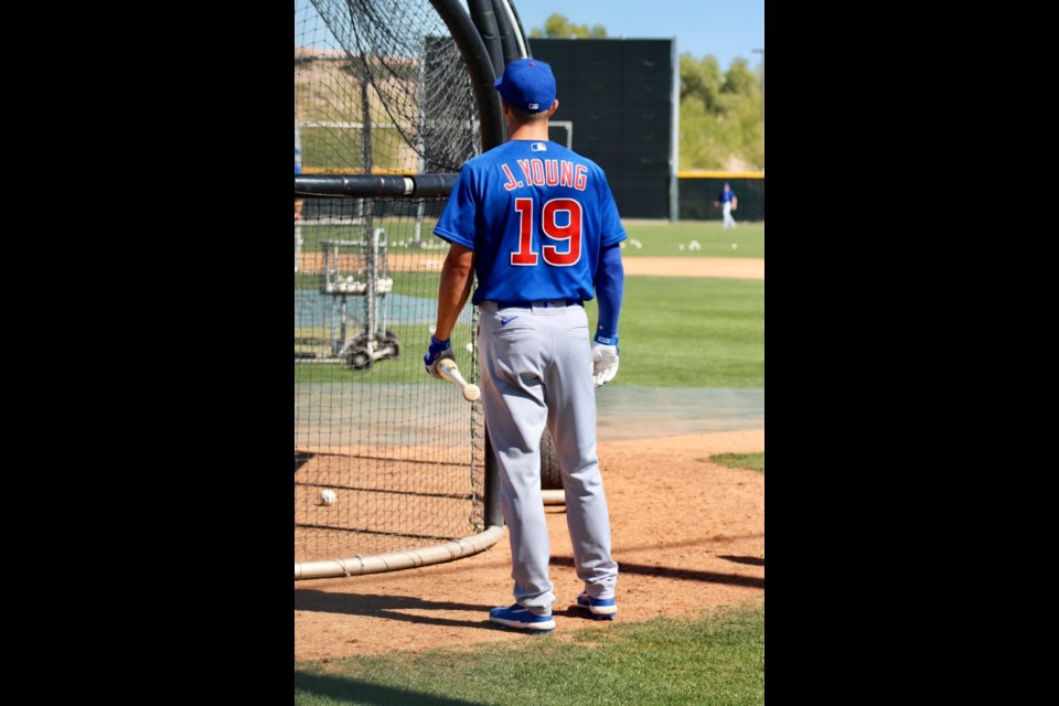 Jared Young of Prince George waits for his turn in the batting cage earlier this month at the Chicago Cubs' spring training facility in Mesa, Ariz.
