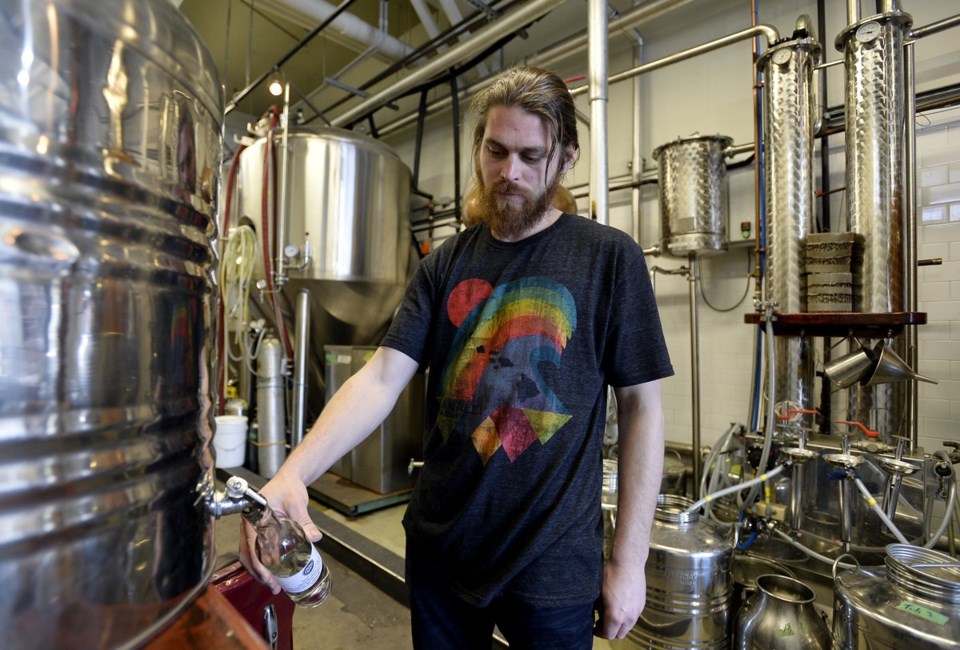 Joel McNichol, distiller at Odd Society Spirits in East Vancouver, is turning excess alcohol into mu