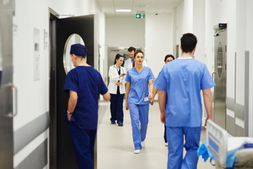 nurses in hospital hallway