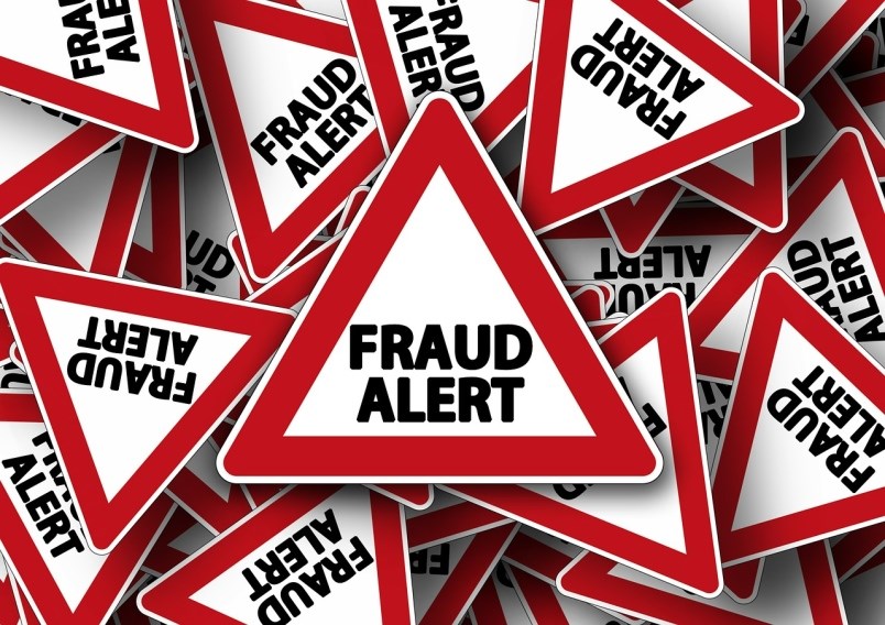 fraud alert triangles pixabay photo