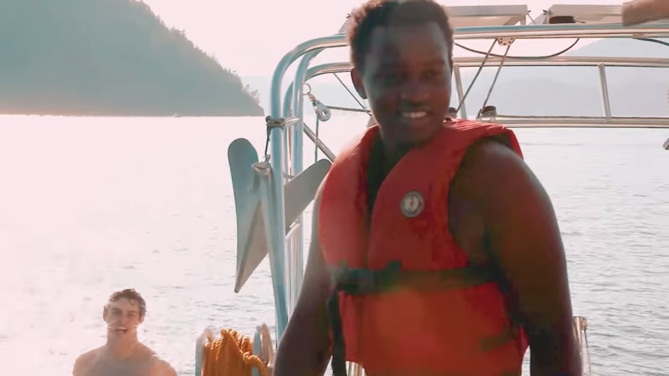 Young people on a boat in Howe Sound