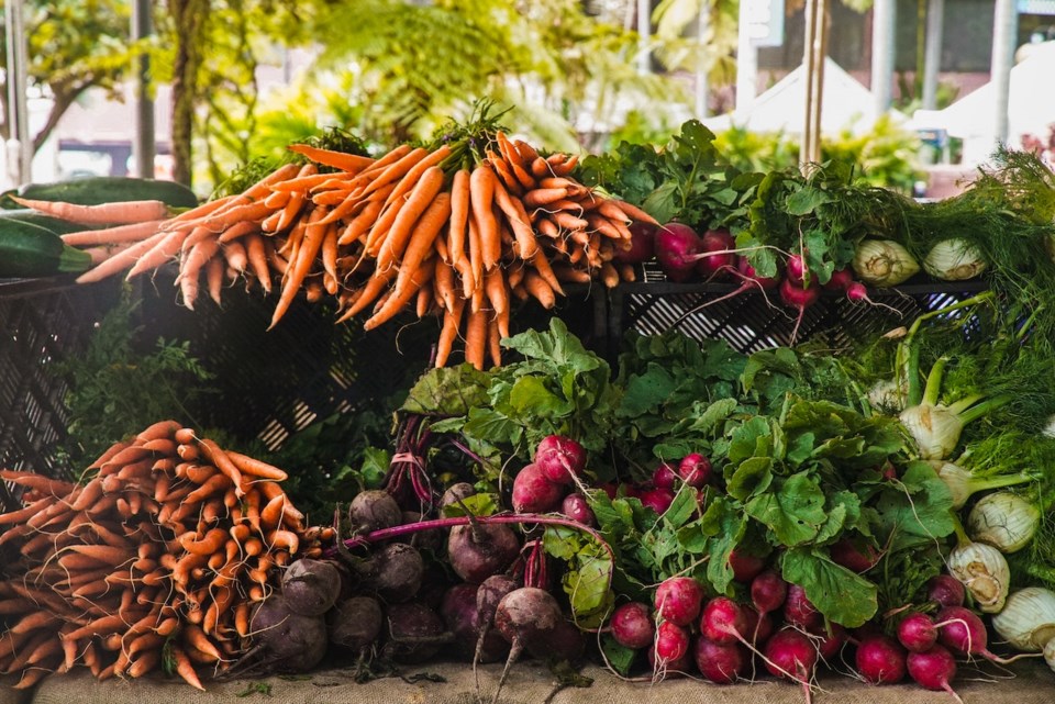 A table full of root vegetables