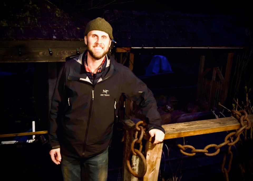 Zac Bligh delivers a basket of food from Tell Your Friends cafe.