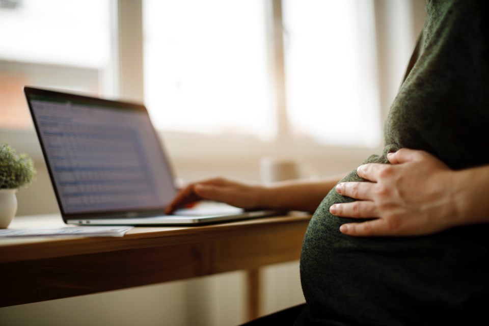 pregnant woman working