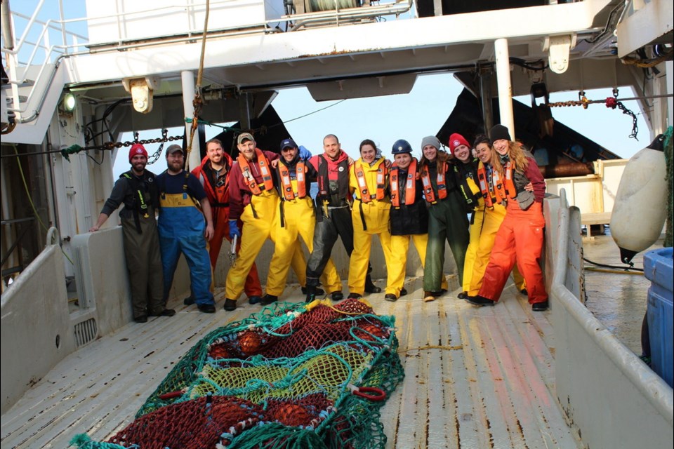 A team of scientists on board the Pacific Legacy No.1 chartered trawler.