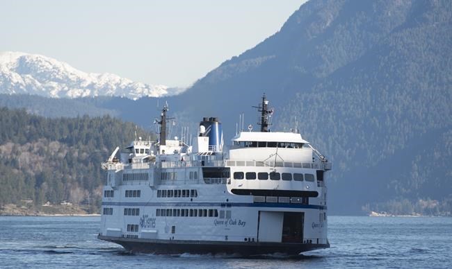 A B.C. Ferries vessel is seen arriving at Horseshoe Bay near West Vancouver on March 16, 2020. THE CANADIAN PRESS/Jonathan Hayward