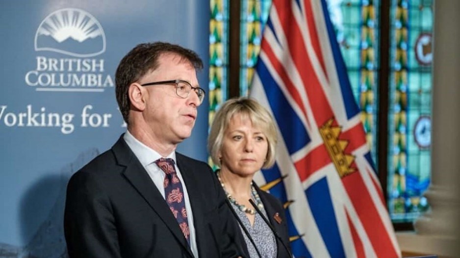 BC Health Minister Adrian Dix and public health officer Bonnie Henry at daily pandemic briefing