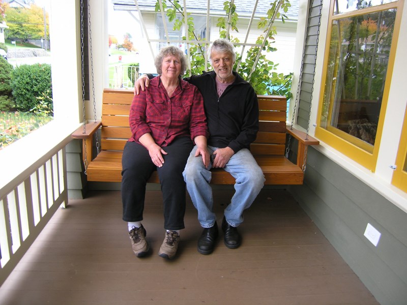 Will and Brenda Van Delft on their front porch swing which was a Christmas gift from their children. The room at the front of the house was removed and converted back to the original open front porch. Photo courtesy of Will and Brenda Van Delft