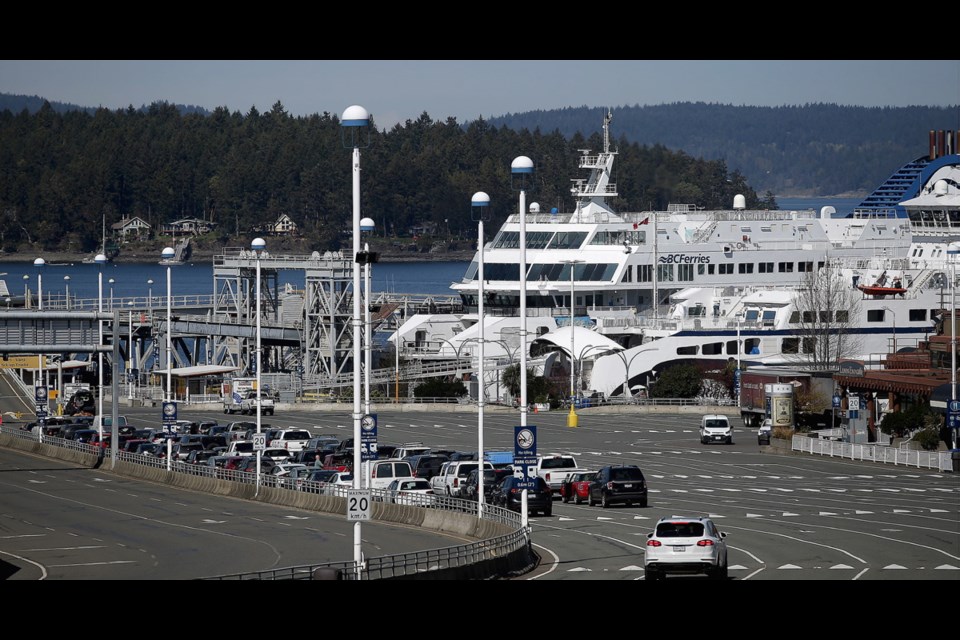 Vehicles in line for boarding at Swartz Bay terminal on Friday, April 10, 2020