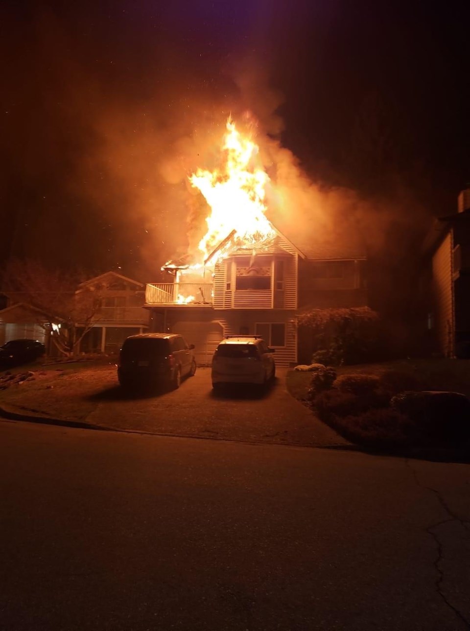 The Jaenickes house ablaze in the early morning hours, April 11. Not long after, the roof would coll