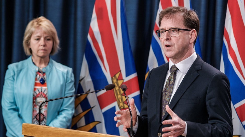 BC Health Minister Adrian Dix, right, and public health officer Bonnie Henry at daily pandemic brief