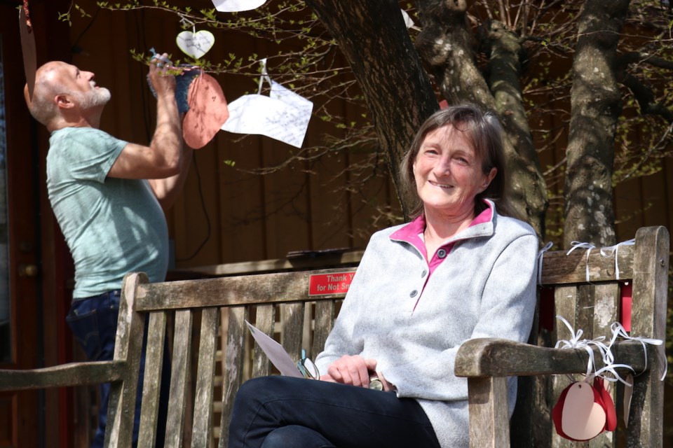 Elaine's former neighbour Ross has been coming by regularly to add more hearts to the tree.