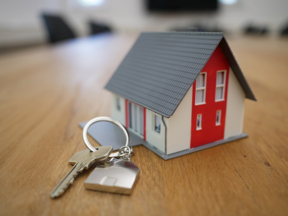 Tiny model house with a key