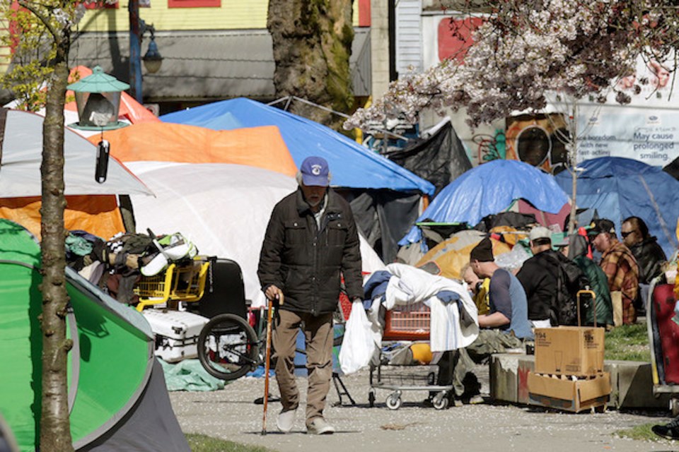Mayor wants homeless moved into hotels. | Rob Kruyt