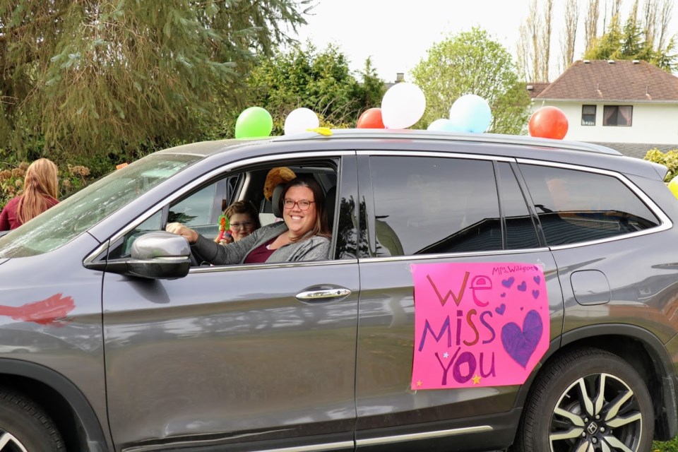 Teachers from Hawthorne Elementary in Ladner held a car parade through the Hawthorne catchment area on Friday to show some love and support for their students and parents.
