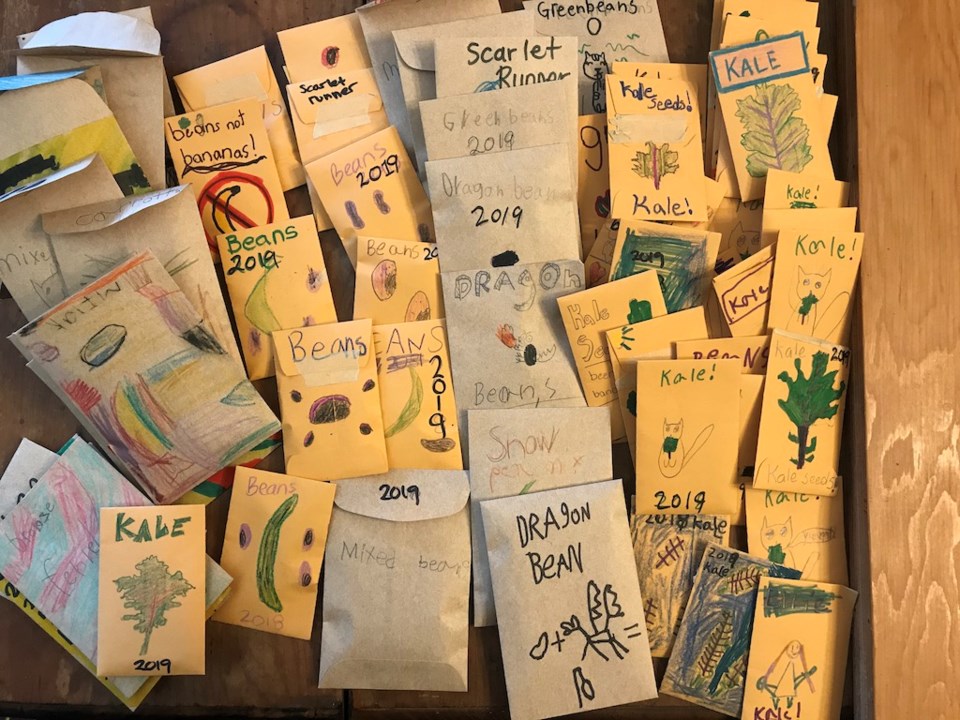 Seed packets coloured by BICS kids