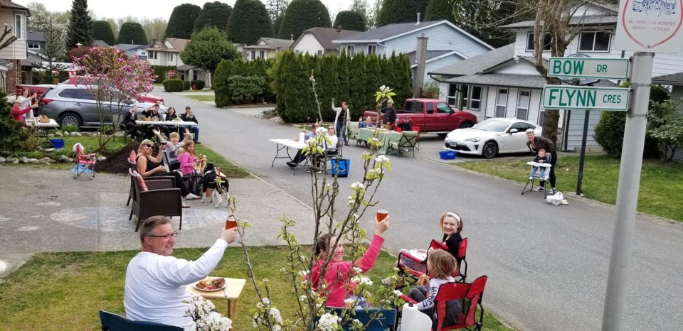 Coquitlam neighbours eat dinner they ordered from a Port Moody