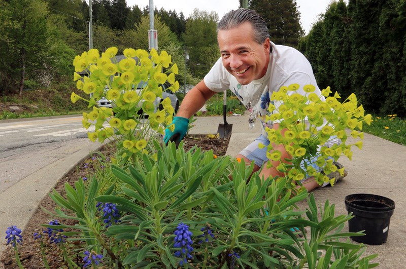 Francois Guernon tending his garden
