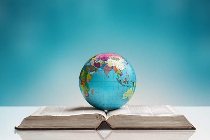 globe and book, international learning, stock photo