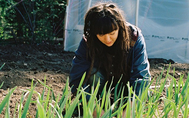 Rachelle Walker tends to her garden in Birken, B.C.