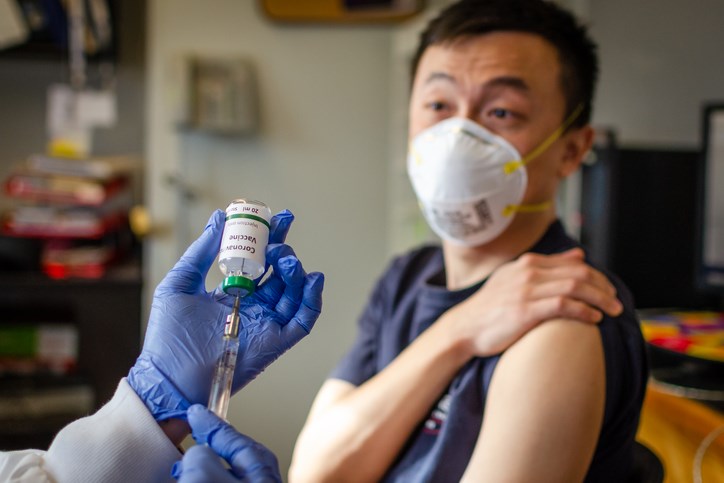 Illustrative photo of man getting vaccinated against coronavirus