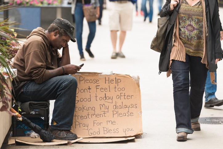 Homeless man smartphone