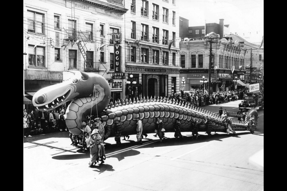 Cadborosaurus makes it way through the Victoria Day Parade, 1955