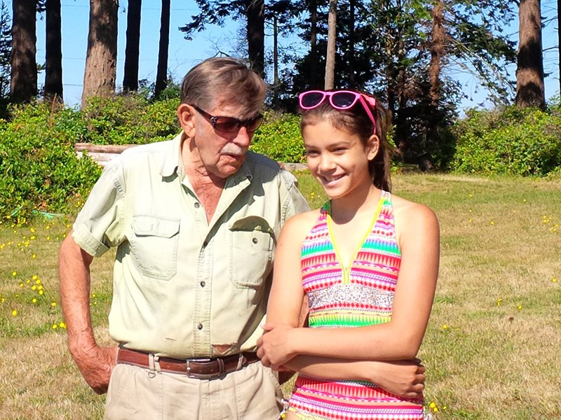 Tia Singh with her grandfather, Ted Lloyd, during a visit to Powell River and Palm Beach a few years ago. Contributed photo