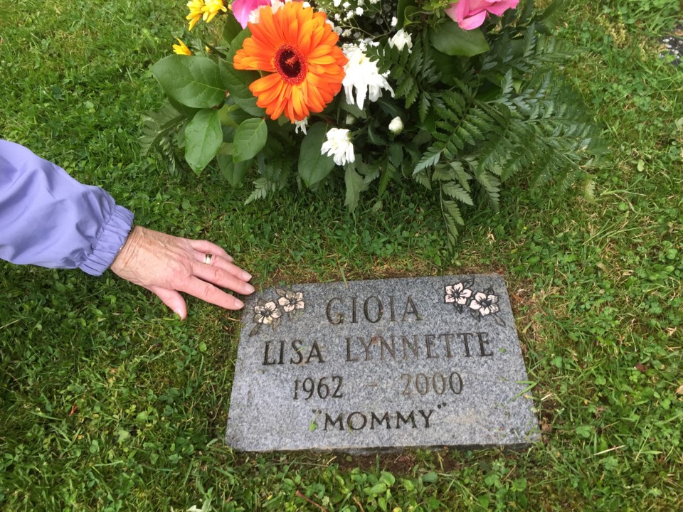 Jacquelin Gioia visits her mother's grave. The last time a thief allegedly stole flowers from the gr