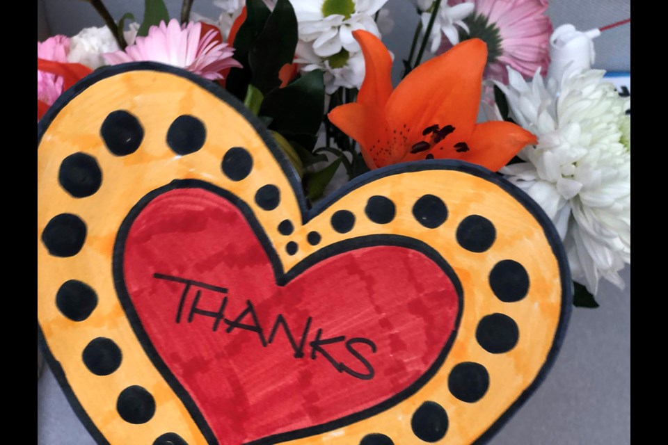 Richmond RCMP, along with their friends and families, have decorated the windows of the detachment to show their appreciation for front line workers during the COVID-19 pandemic.