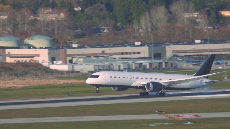 Flight lands at YVR airport. iStock