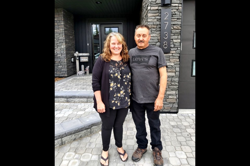 Raylene and Merv Lupul check out their new digs at 2738 Links Dr., as grand prize winners of the Spruce Kings Show Home Lottery.