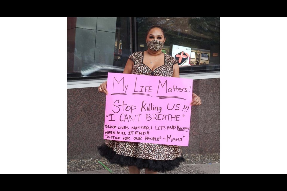 La Toya Barrington, at the protest in Vancouver on Sunday evening. Despite suffering from anxiety, she stepped out in front of a crowd of 3,500 and told of a lifetime of racial abuse while living in Richmond. Photo submitted